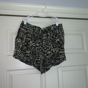 black and tan tribal print shorts